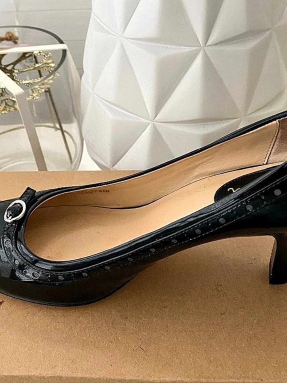 Black leather pumps